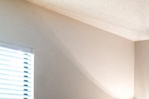 bedroom with large window - Photo Gallery 6