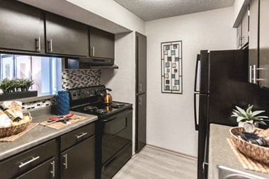 updated kitchen with black appliances