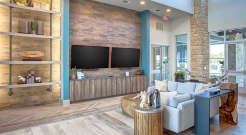 a living room with a couch and a tv