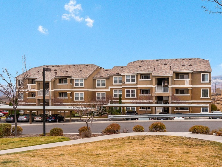 an apartment building on the side of a street