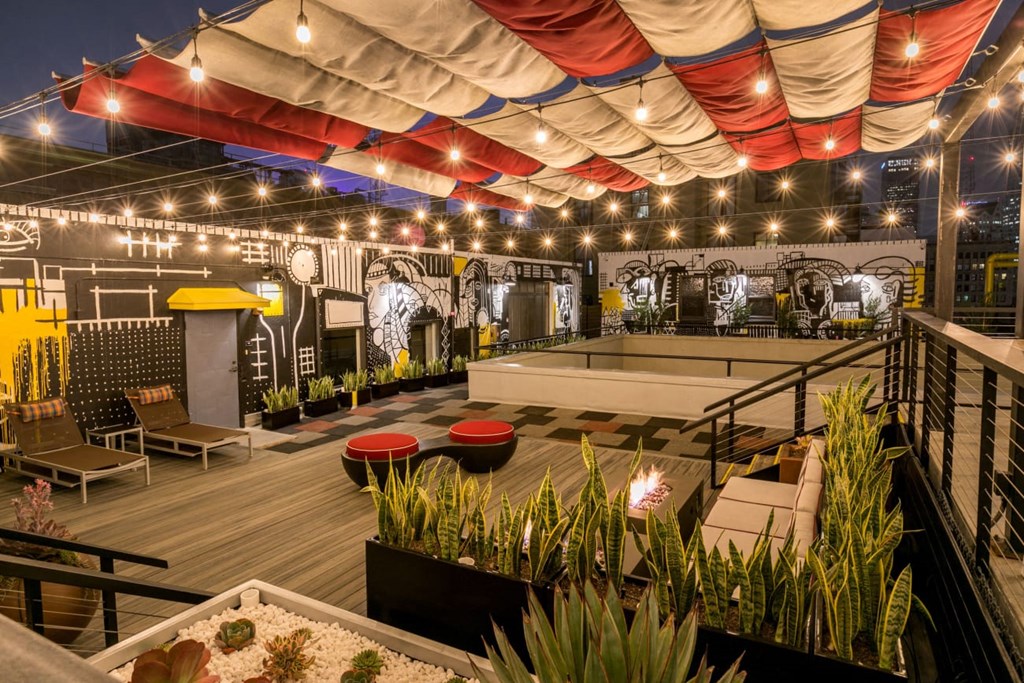 Pet Friendly Apartments in Downtown LA - Santa Fe Lofts - Rooftop Terrace with Fire Features, Lounge Area, BBQ Area, and Panoramic Views of the City