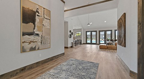 the living room is open to the dining room and kitchen