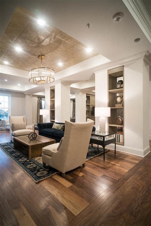 a living room with a couch and a table