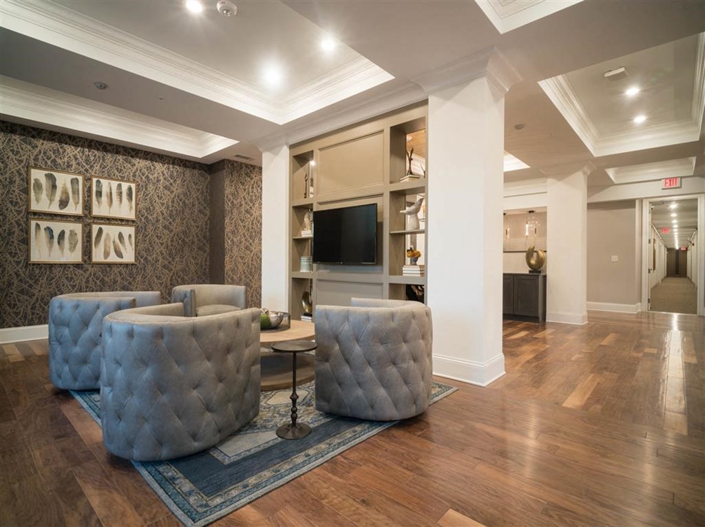 a living room with couches and a television