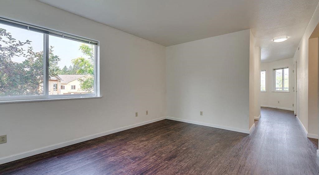 bedroom with wood-style flooring