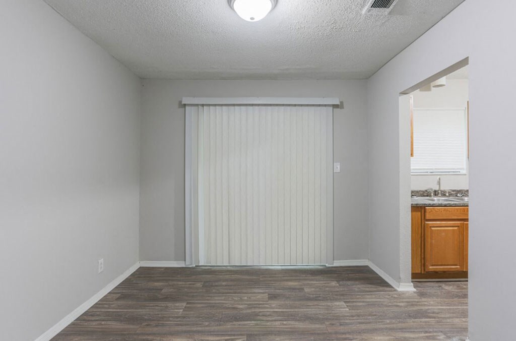 The element 4411, Macon, GA Apartment  spacious bedroom with hardwood flooring