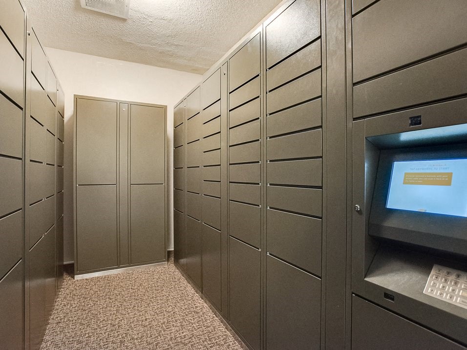 a row of lockers and a computer in a room