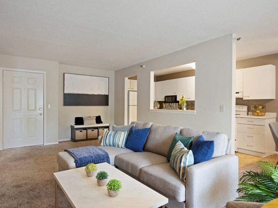 a living room with a couch and a coffee table