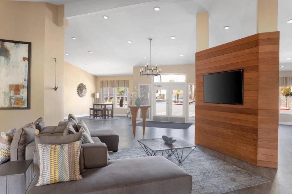 a living room with a couch and a television