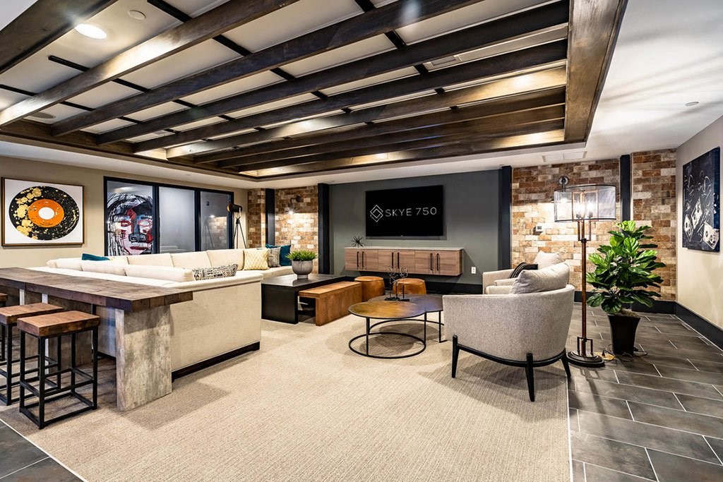 a lobby with a bar and a living room