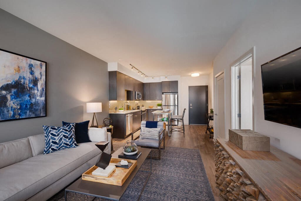 a living room with a couch and a table