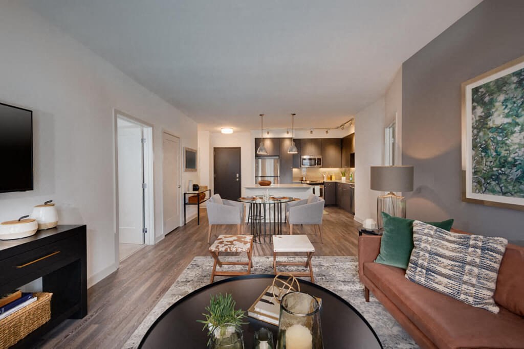 a living room with a couch and a table