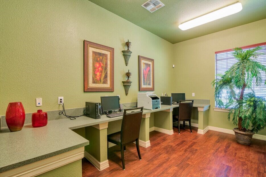 Business center with computers and chairs