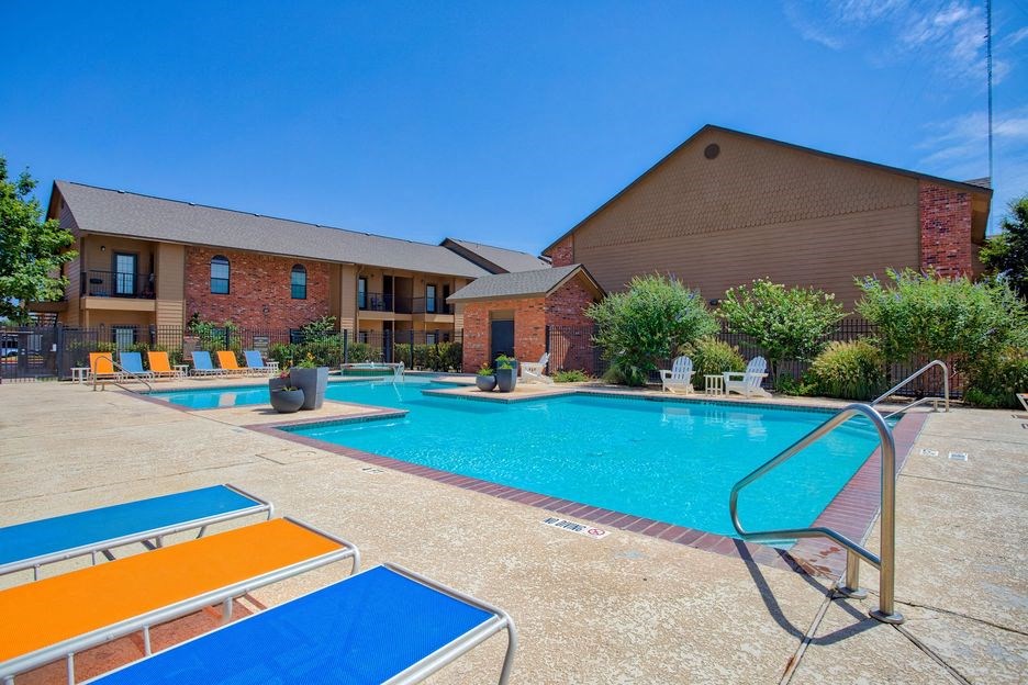 Swimming pool with beach chairs