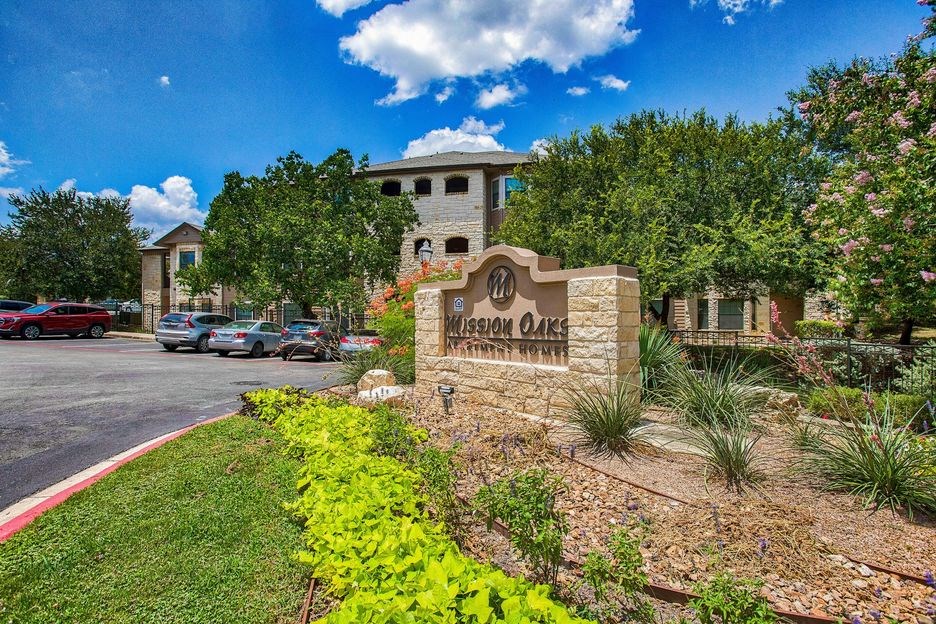 The Mission Oaks street sign with the logo