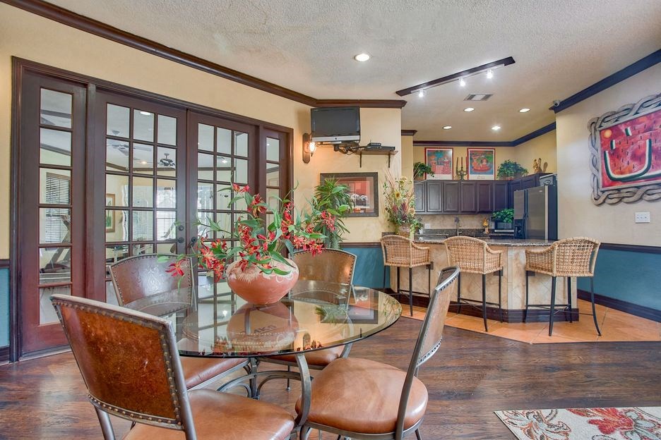 Club house relaxing area with chairs and sofas