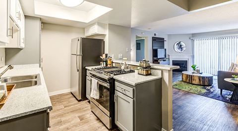 Two BR Apartments in Ontario CA - Veranda Ontario - Kitchen with Wood-Style Flooring and Stainless Steel Appliances