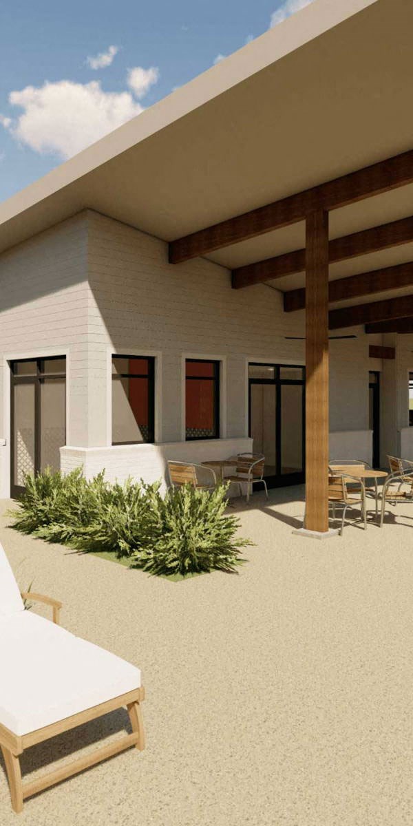a rendering of a building with a patio and chairs