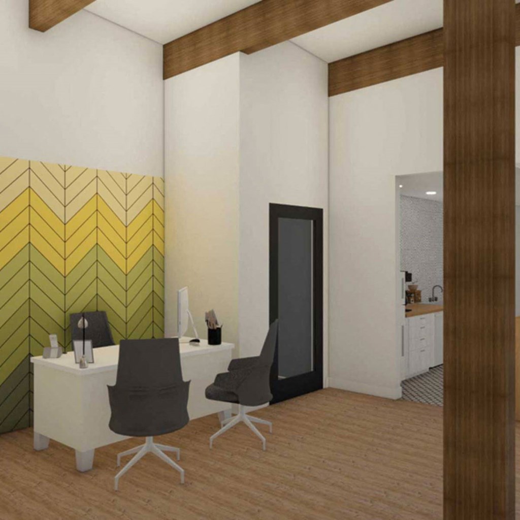 a white office with two chairs and a desk and a mirror