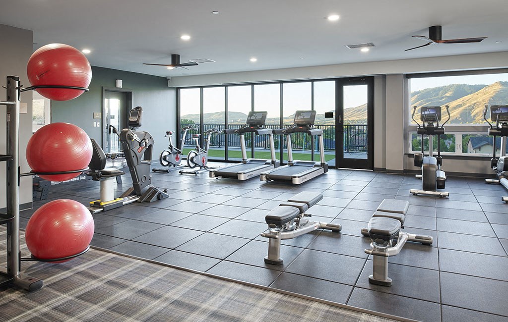 a gym with a view of the mountains