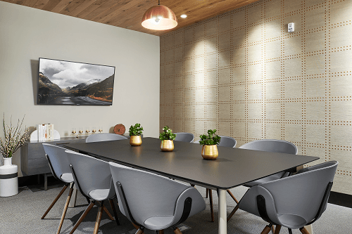 a conference room with a large table and chairs