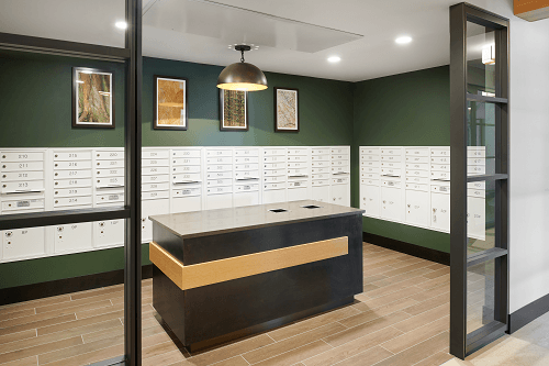 a locker room with a counter and lockers on the wall