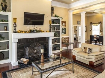 Parkway Grand apartments in Decatur Georgia photo of clubhouse with fireplace - Photo Gallery 14