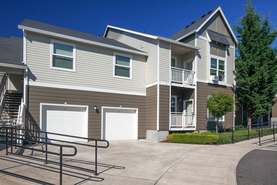our apartments have a spacious driveway and garages with trees