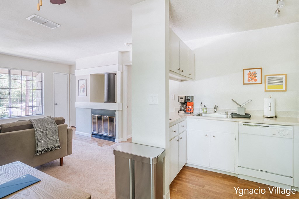 a kitchen and living room in a 555 waverly unit