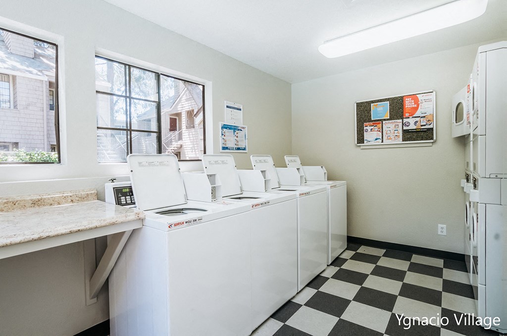 a laundry room with washer and dryer