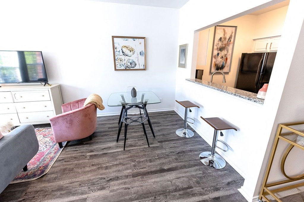 a living room with a couch and a chair