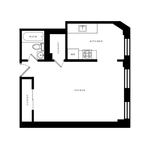 a floor plan of a 1 bedroom floor plan with a loft and a staircase