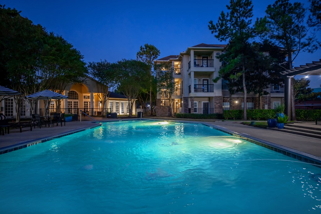 Pet-Friendly Apartments in Houston, TX – Westchase Forest – Photo of the swimming pool at night at the preserve at polk apartments