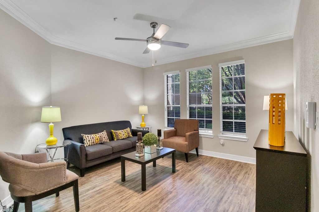 Apartments near Alief Texas for Rent – Gramercy Park - Photo of living room with hardwood floors and ceiling fan