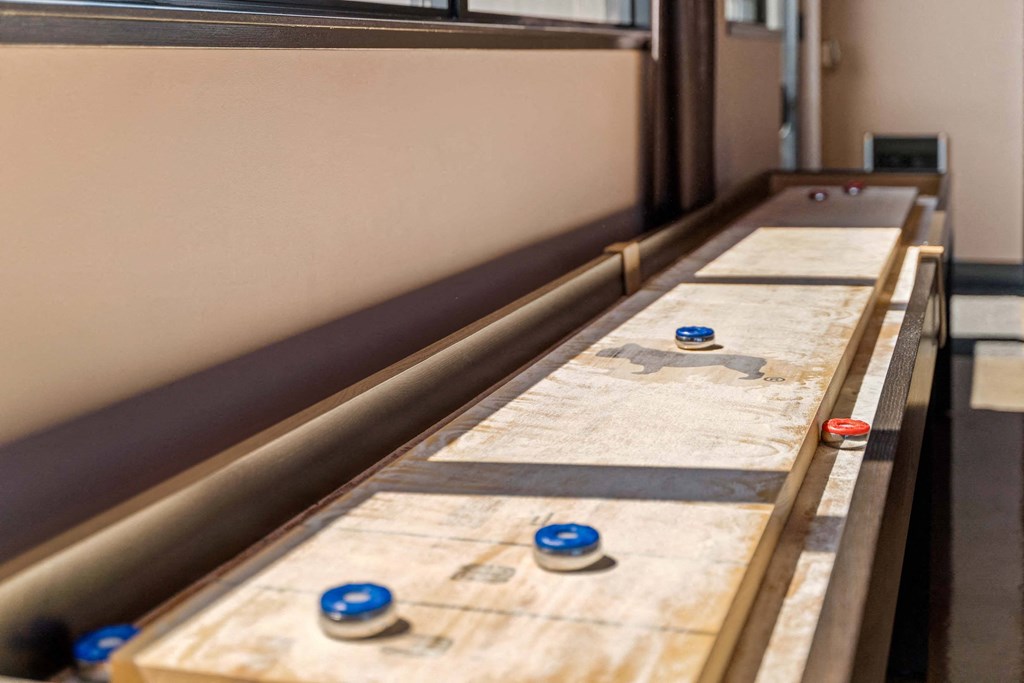 a row of pins on a table in a room