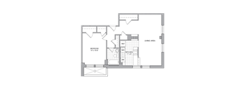 A floor plan of a living space showing a bedroom, kitchen, and living area.