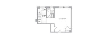 A floor plan of a small apartment with a kitchen and living area.