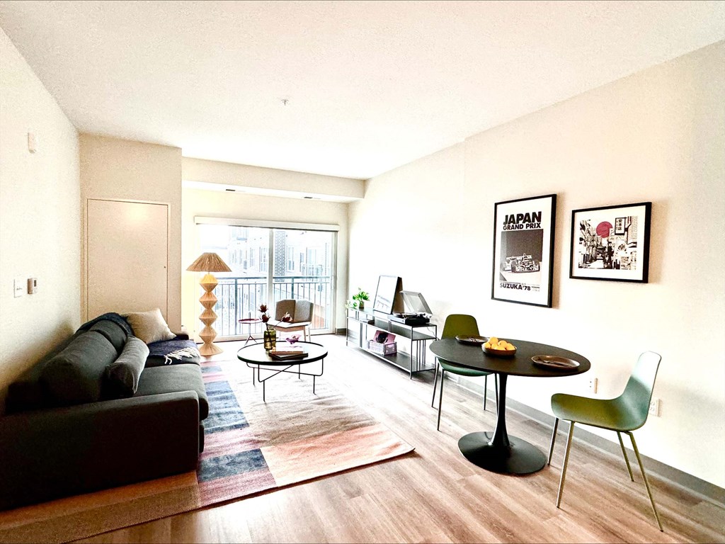 a living room with a couch and a table