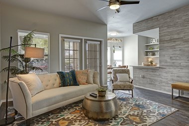 Apartments in San Antonio TX - Open Layout Living Room Featuring Hardwood Floors and Stylish Interior