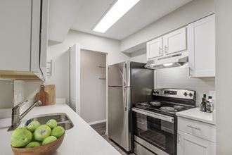 the timbers raleigh nc apartments for rent kitchen with stainless steel appliances and white cabinets with stone counter tops and pantry
