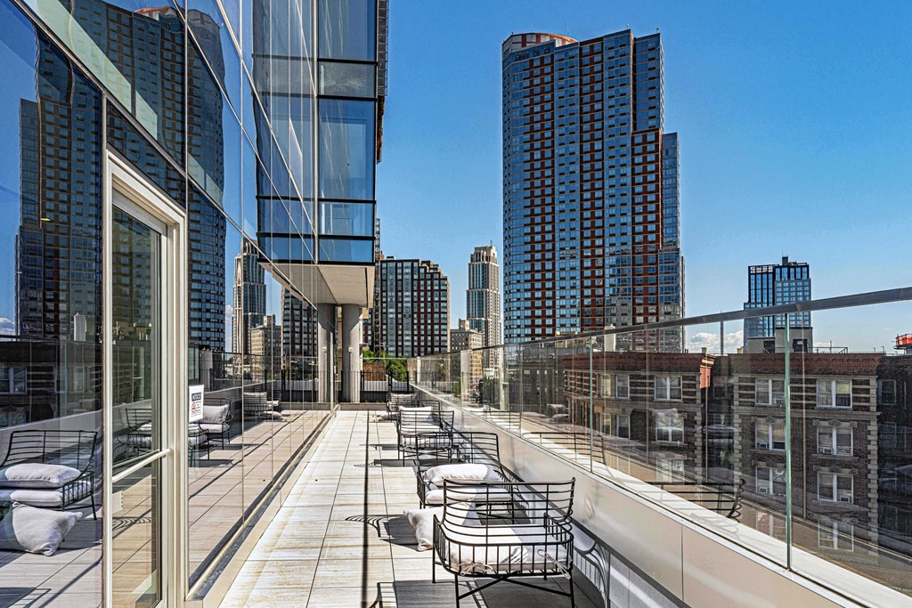 3thirty3 new rochelle ny apartment high rise photo of outdoor seating area overlooking skyline views