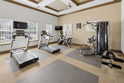 Summerset Apartment Affordable Zephyrhills, FL apartments A spacious gym with treadmills, elliptical machines, and a weight machine.