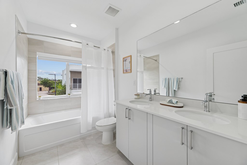 Pearl at Pompano Beach Townhomes in Pompano Beach, FL bathroom with window