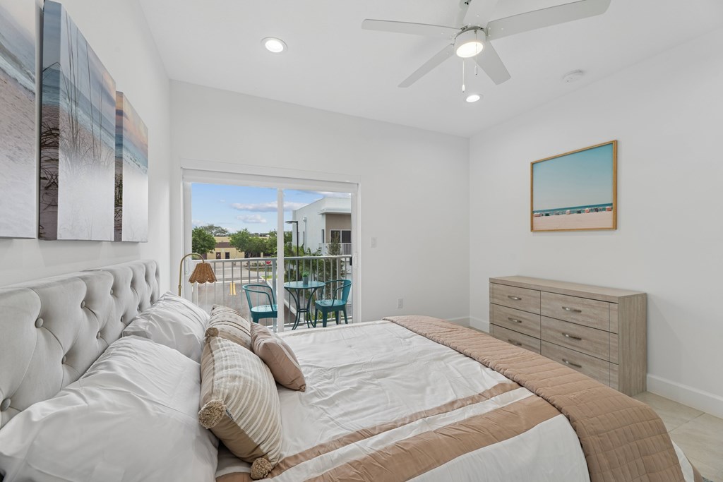 Pearl at Pompano Beach Townhomes in Pompano Beach, FL bedroom with patio
