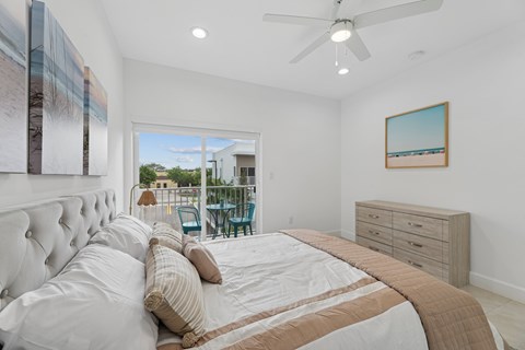 primary bedroom with natural light in luxury home for rent Pompano Beach Florida