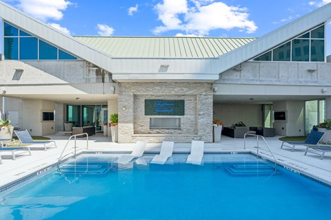 A modern house with a swimming pool in the backyard.