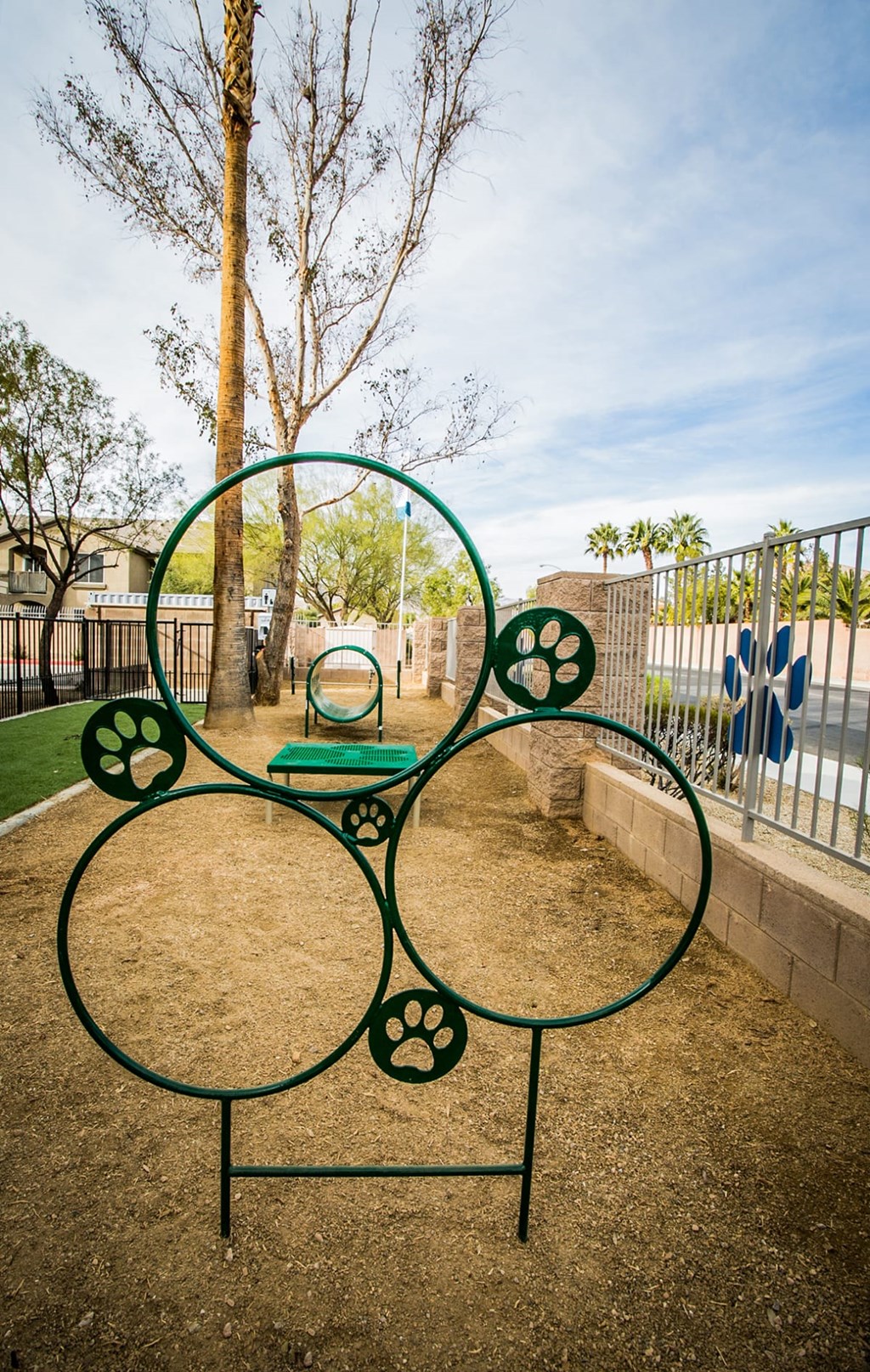 a playground with a round table and a ball in the middle