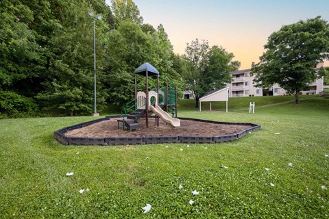 Outdoor playground and green space at Sugar Creek Apartments Winston Salem
