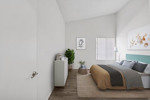Cozy bedroom with soft tones at Sunnyside Senior Apartments 1 bedroom for rent
