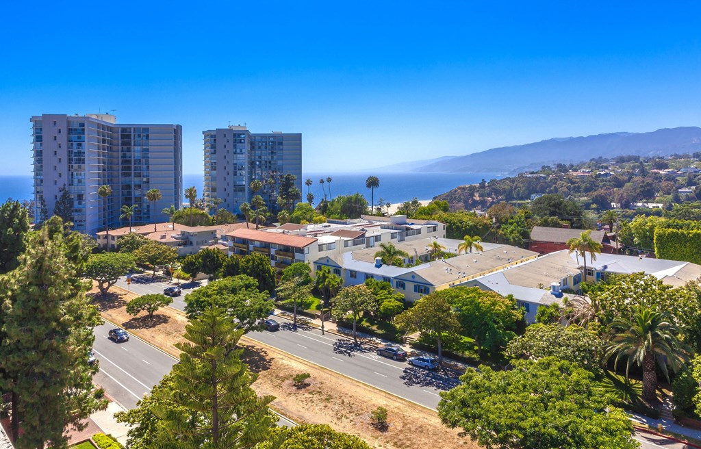 an aerial view of the city of oceanside with the ocean in the background